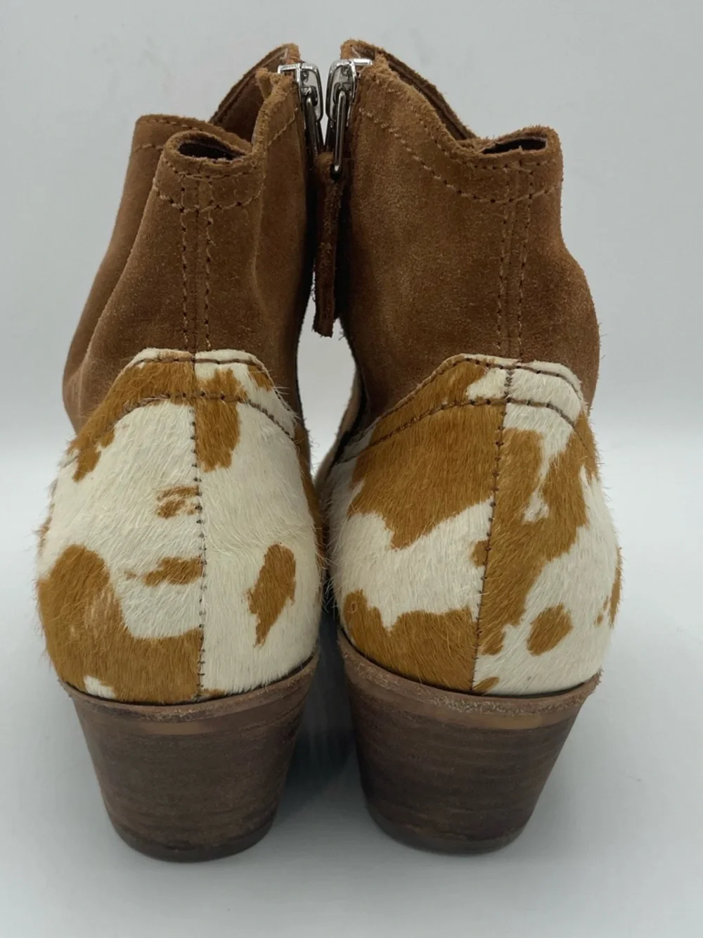Dolce Vita Senica Suede Western Ankle Boot with Cowhide Heel Accent.